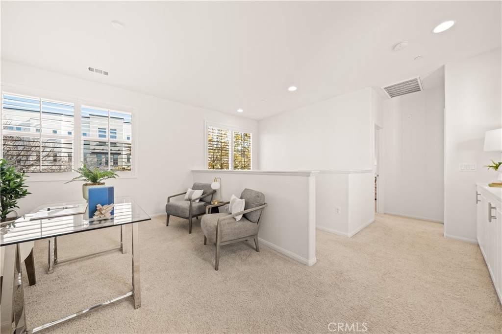 161 Fixie Irvine, CA 92618 - Photo 24 of 47 a living room with furniture and a potted plant