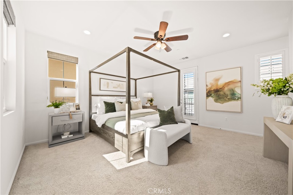 161 Fixie Irvine, CA 92618 - Photo 26 of 47 a bedroom with a bed and a chandelier