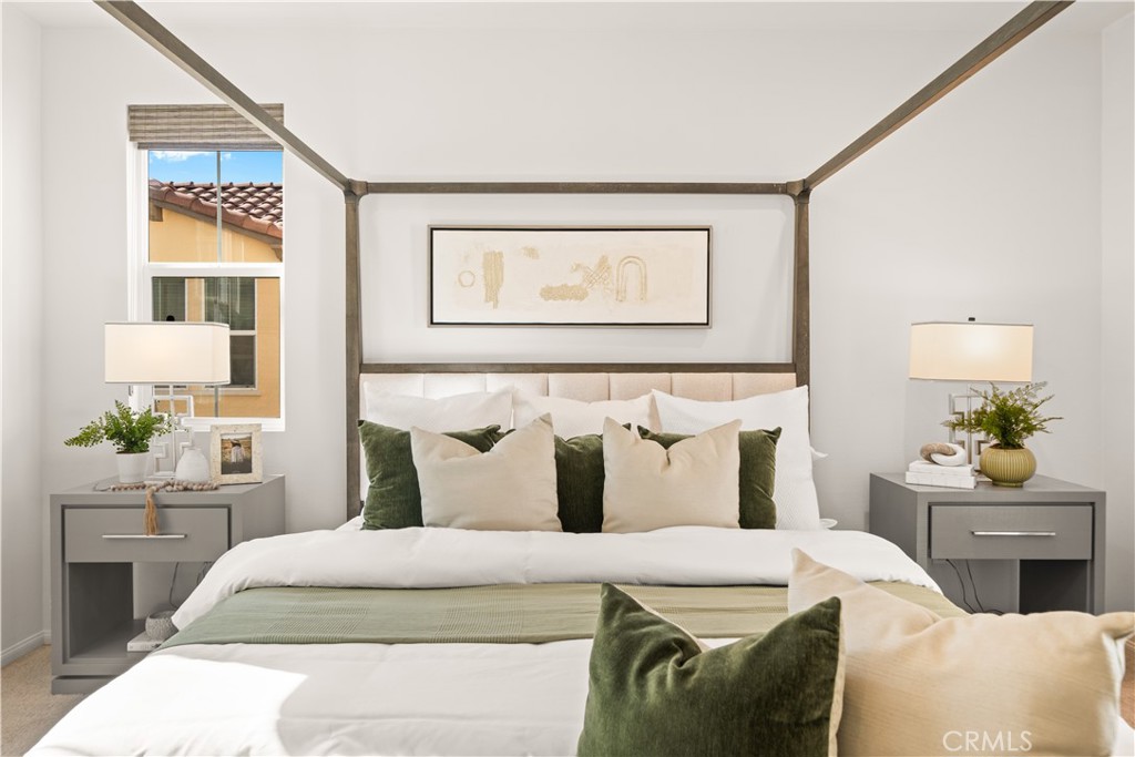 161 Fixie Irvine, CA 92618 - Photo 27 of 47 a bedroom with a bed and window