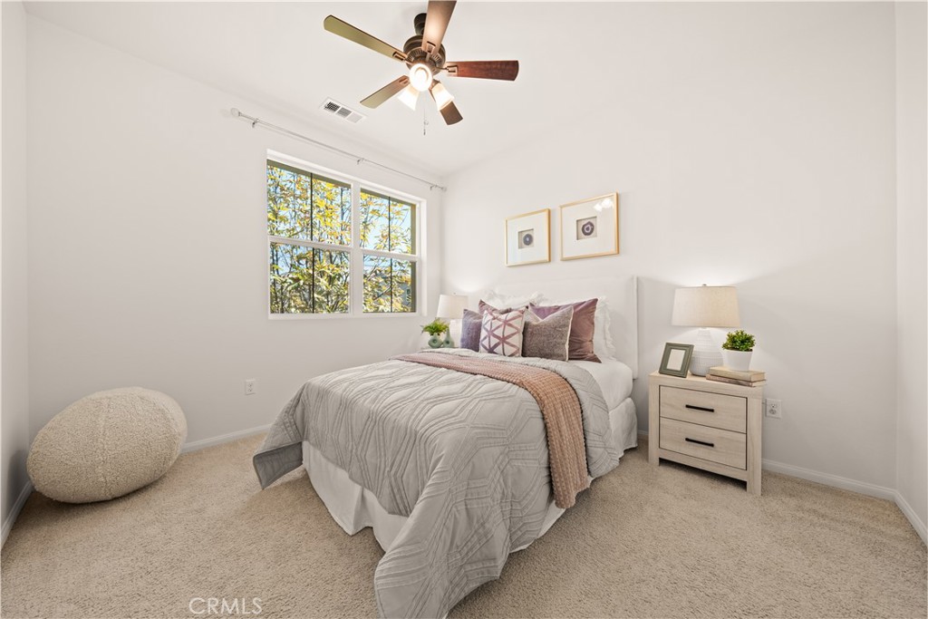 161 Fixie Irvine, CA 92618 - Photo 32 of 47 a spacious bedroom with a bed and a window