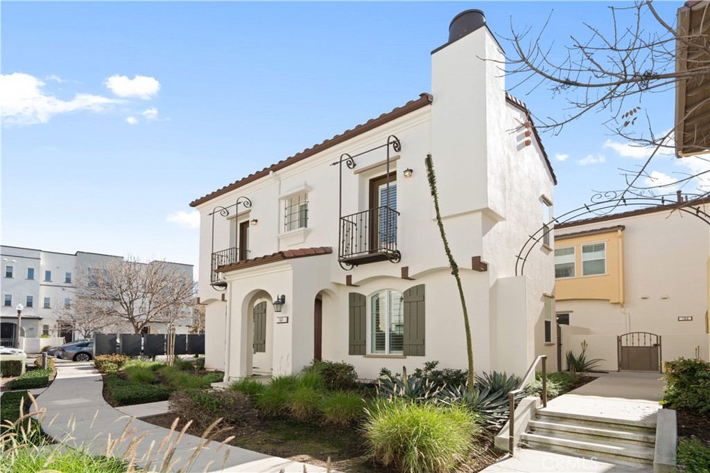 161 Fixie Irvine, CA 92618 - Photo 36 of 47 a front view of a house with a yard