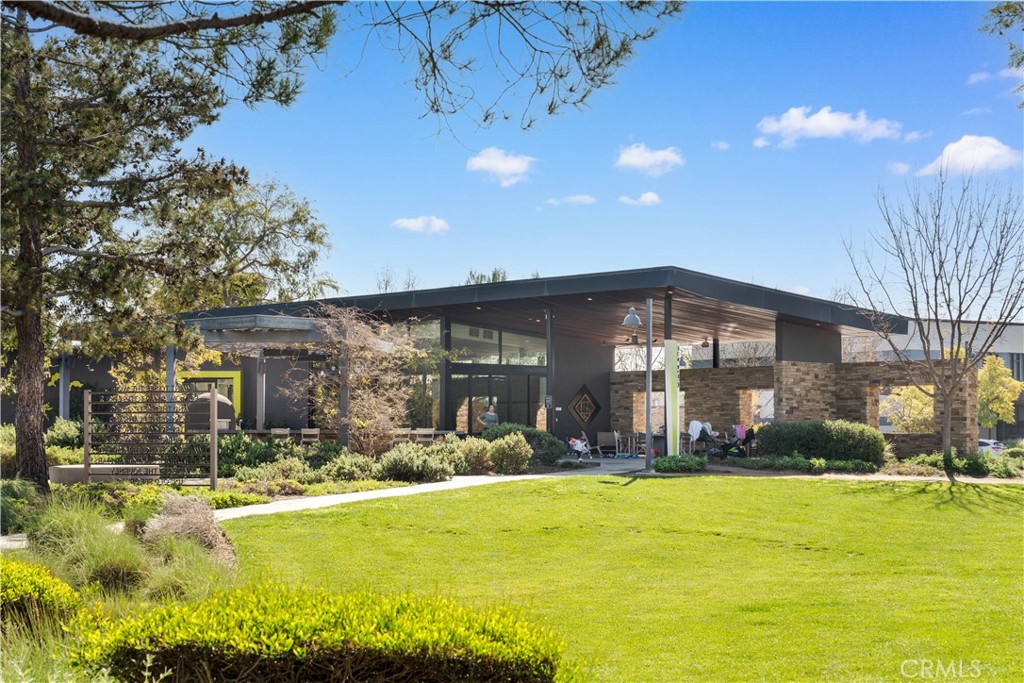 161 Fixie Irvine, CA 92618 - Photo 41 of 47 a front view of building with an outdoor space and seating area