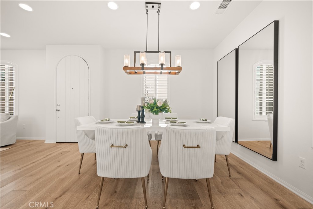 161 Fixie Irvine, CA 92618 - Photo 9 of 47 a view of a dining room with furniture window and wooden floor