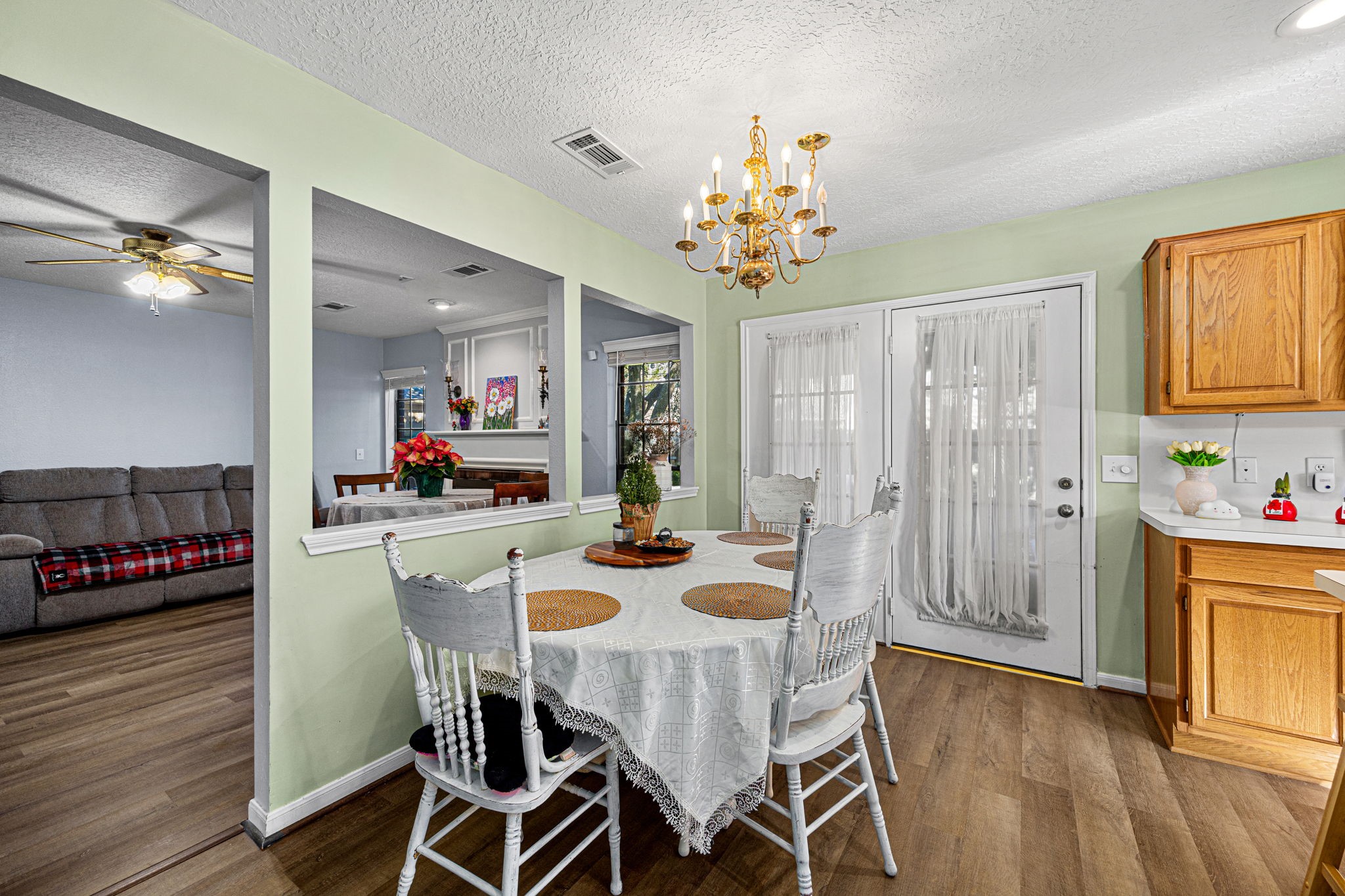 3402 Deeds Road Houston, TX 77084 - Photo 12 of 35 a view of a dining room with furniture and wooden floor