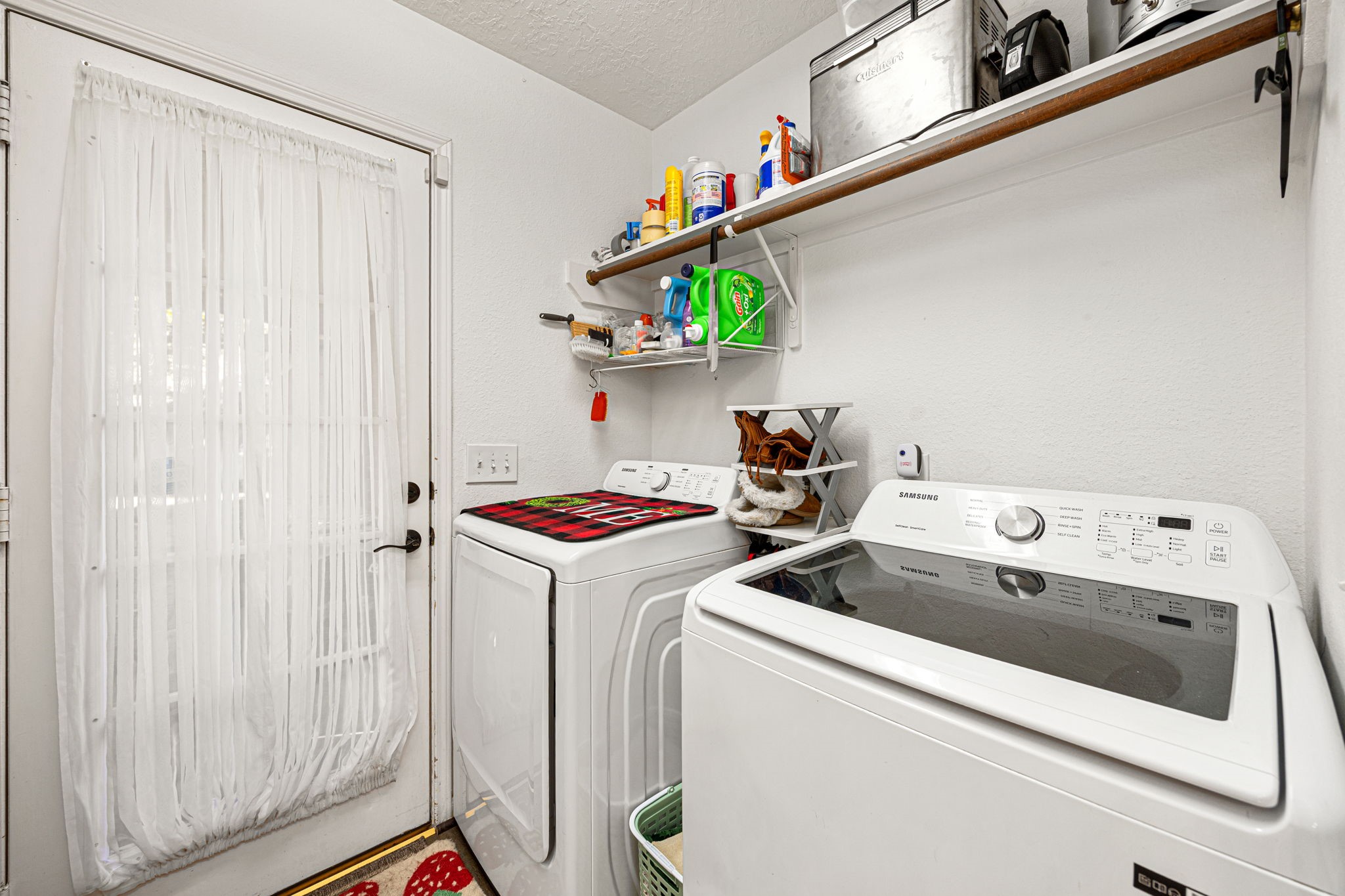 3402 Deeds Road Houston, TX 77084 - Photo 18 of 35 a utility room with dryer and washer