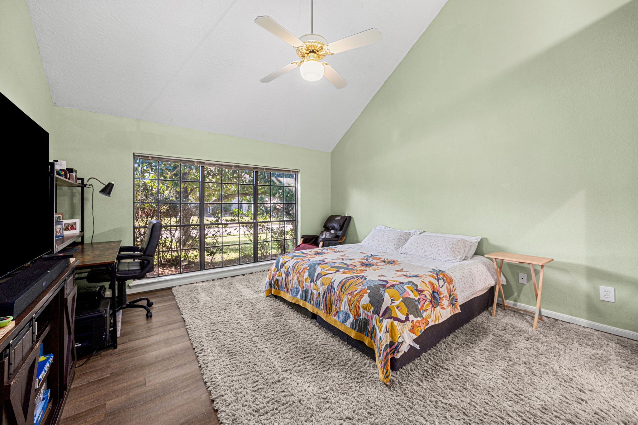 3402 Deeds Road Houston, TX 77084 - Photo 24 of 35 a bed sitting in a bedroom next to a window