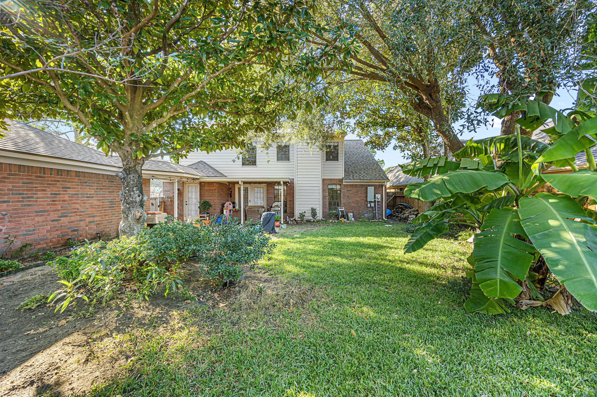 3402 Deeds Road Houston, TX 77084 - Photo 34 of 35 a front view of a house with a garden