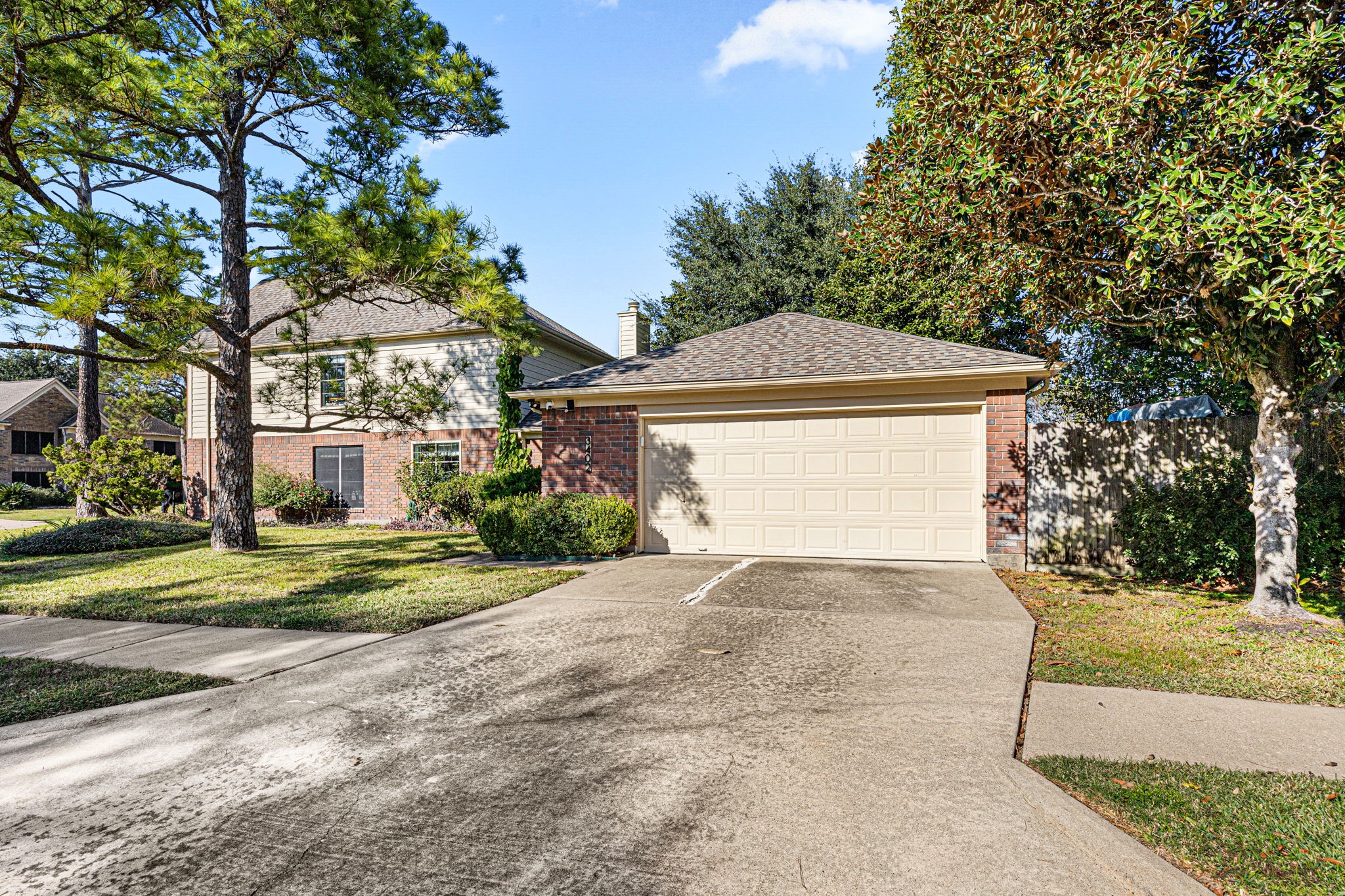 3402 Deeds Road Houston, TX 77084 - Photo 4 of 35 a front view of a house with a yard
