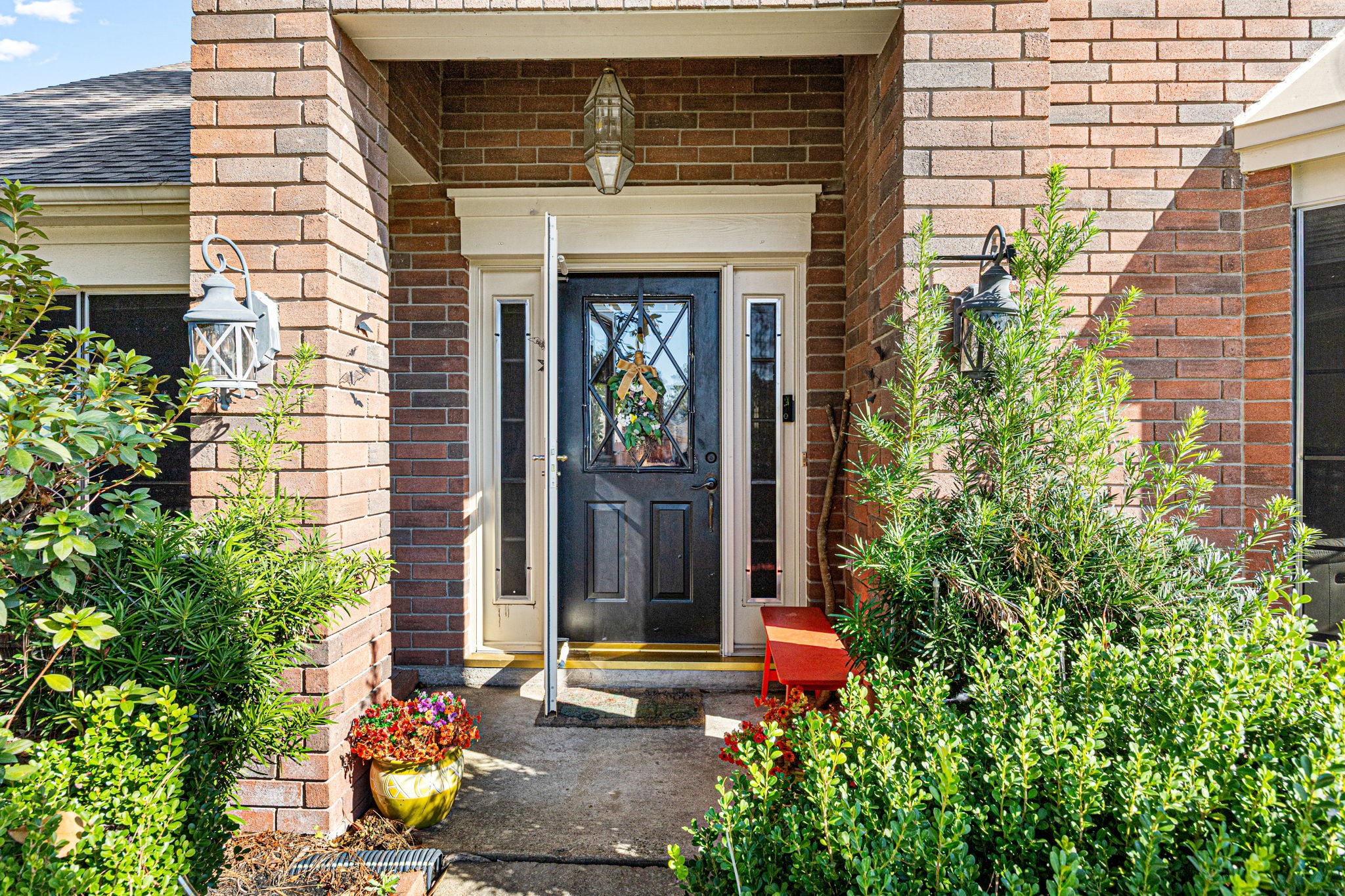 3402 Deeds Road Houston, TX 77084 - Photo 5 of 35 a couple of potted plants in front of door