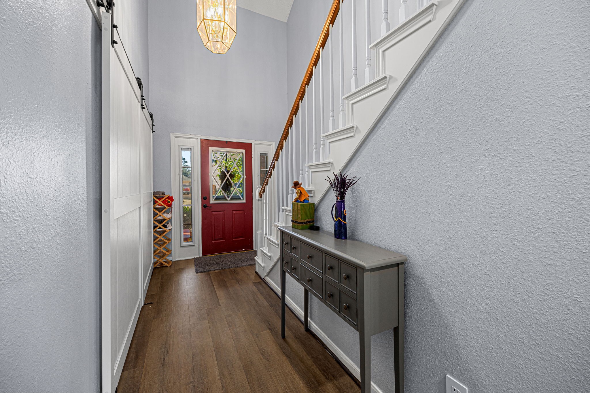 3402 Deeds Road Houston, TX 77084 - Photo 7 of 35 a view of hallway with stairs and wooden floor