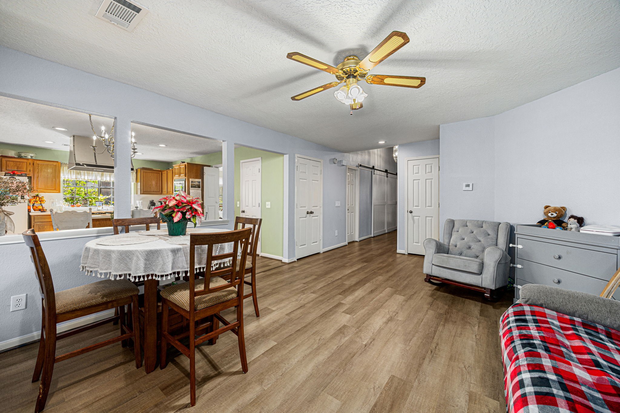 3402 Deeds Road Houston, TX 77084 - Photo 9 of 35 a view of a dining room with furniture and wooden floor