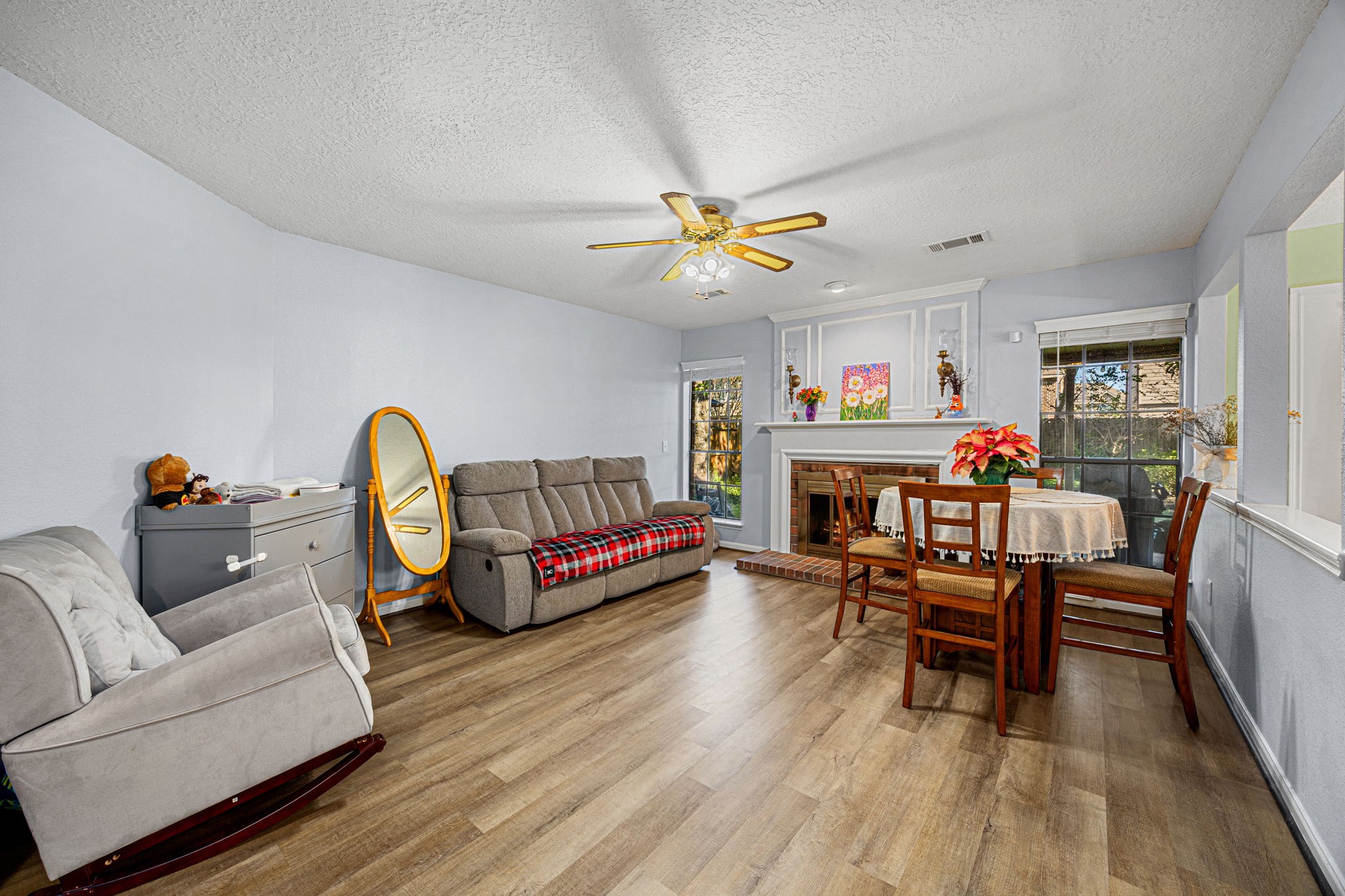 3402 Deeds Road Houston, TX 77084 - Photo 10 of 35 a living room with furniture and a wooden floor