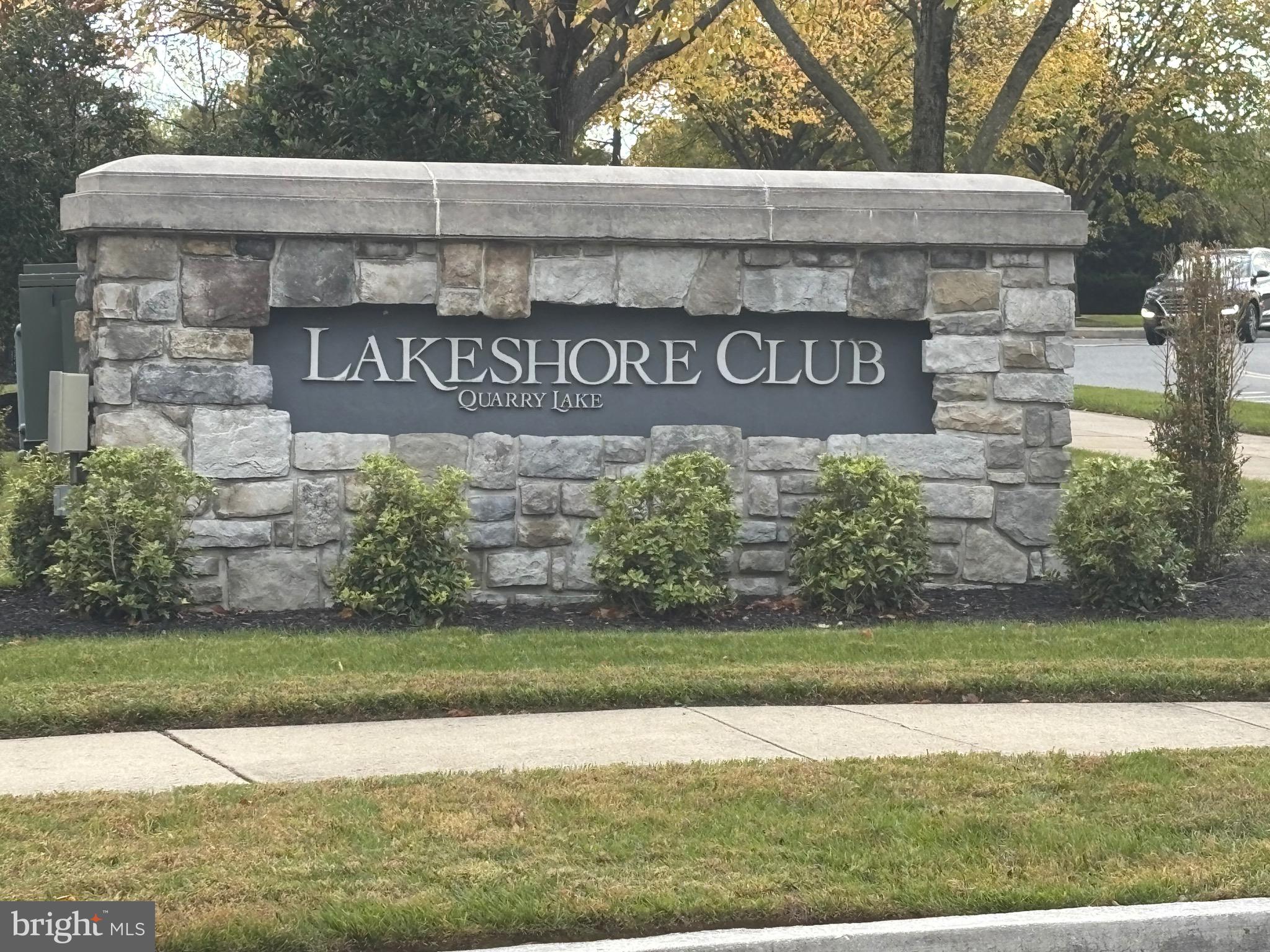 7300 Travertine Drive, Unit 302 Baltimore, MD 21209 - Photo 26 of 30 a sign on the side of a building