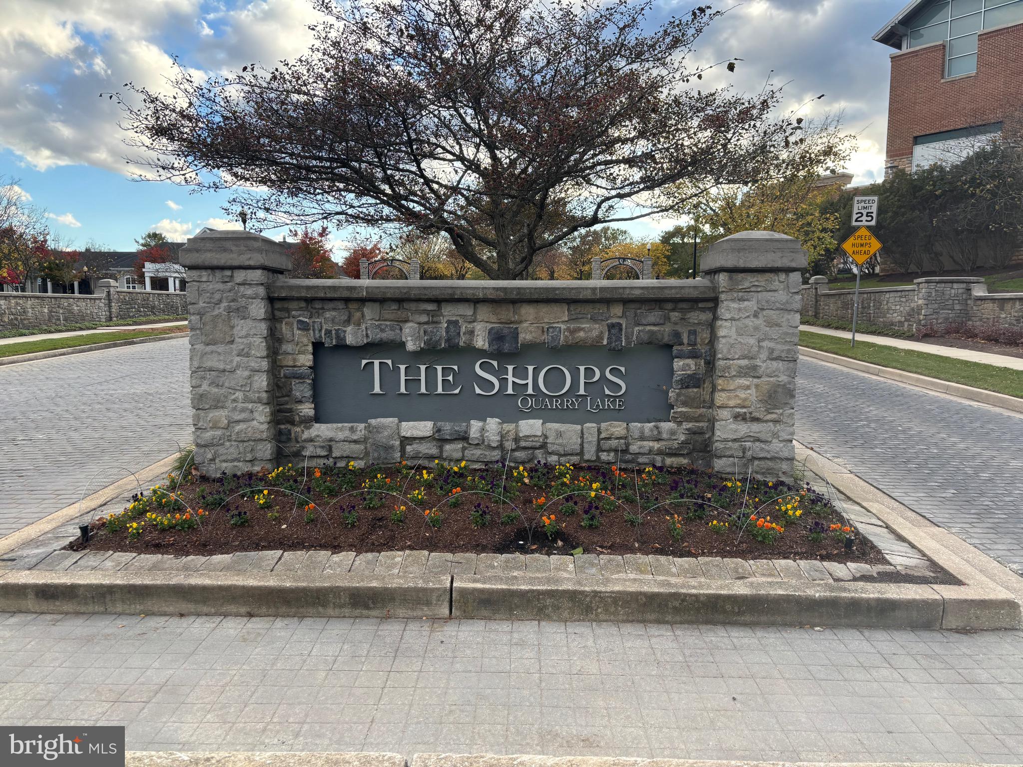 7300 Travertine Drive, Unit 302 Baltimore, MD 21209 - Photo 28 of 30 a sign on the side of a building