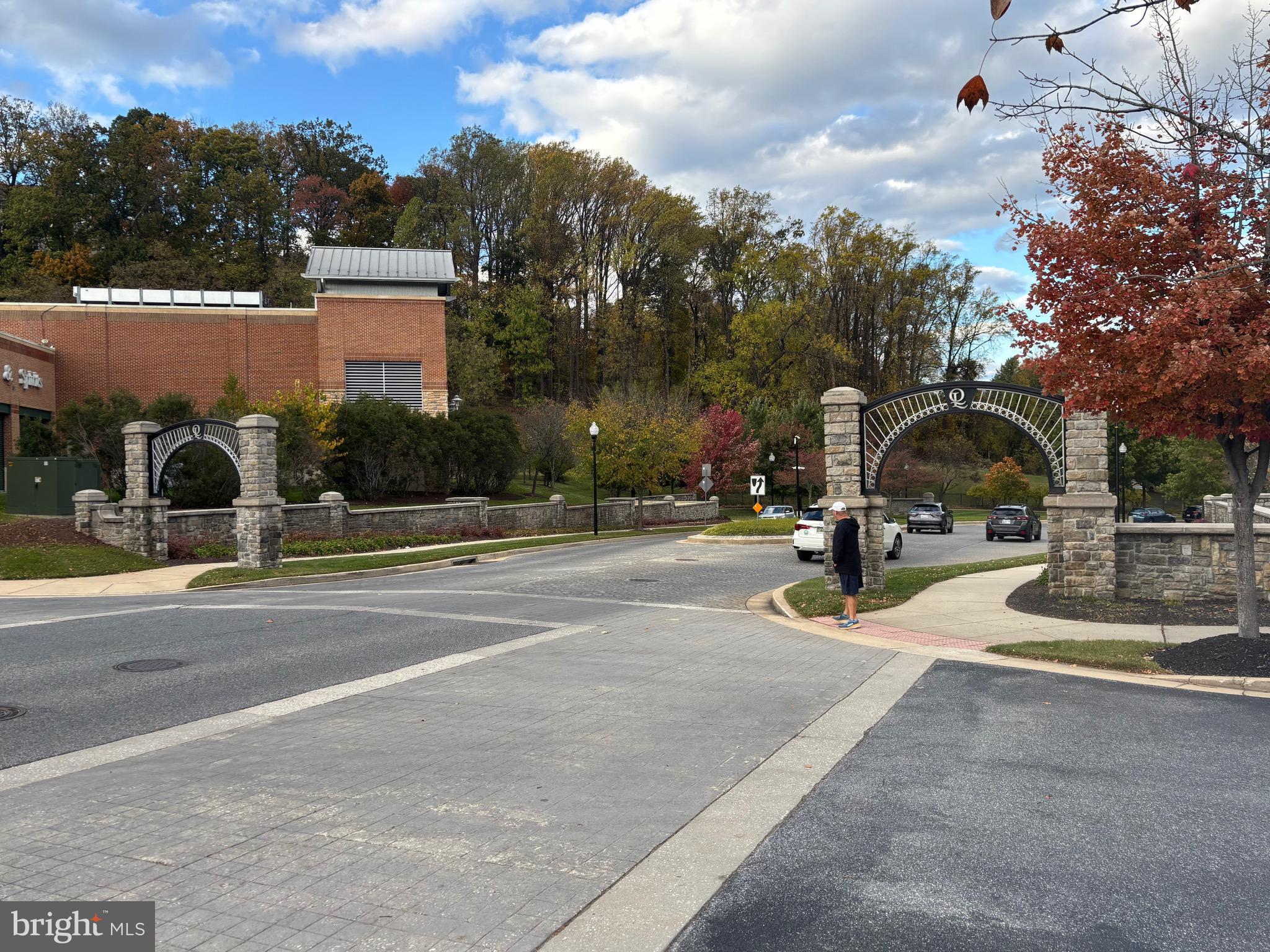 7300 Travertine Drive, Unit 302 Baltimore, MD 21209 - Photo 29 of 30 a view of a park with swings and slides