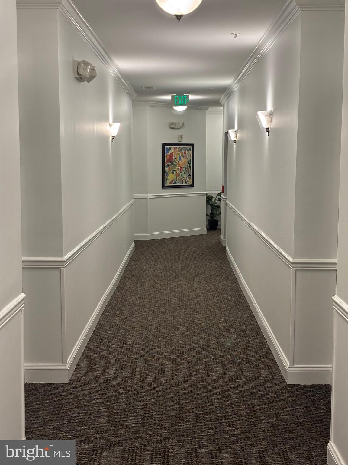 7300 Travertine Drive, Unit 302 Baltimore, MD 21209 - Photo 5 of 30 a view of hallway with stairs