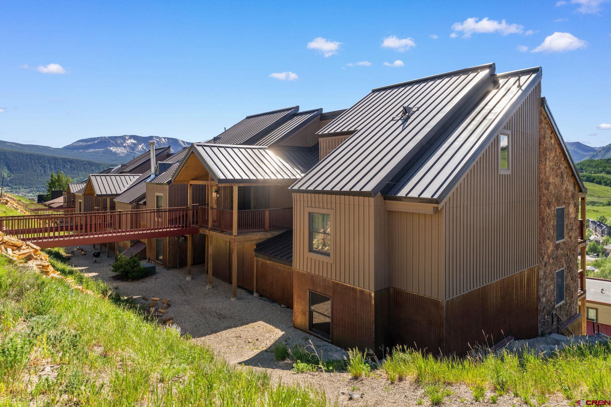 72 Hunter Hill Road, Unit I204 Crested Butte, CO 81225 - Photo 40 of 44 a front view of a house