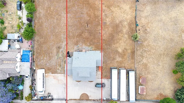 an aerial view of a house with garden