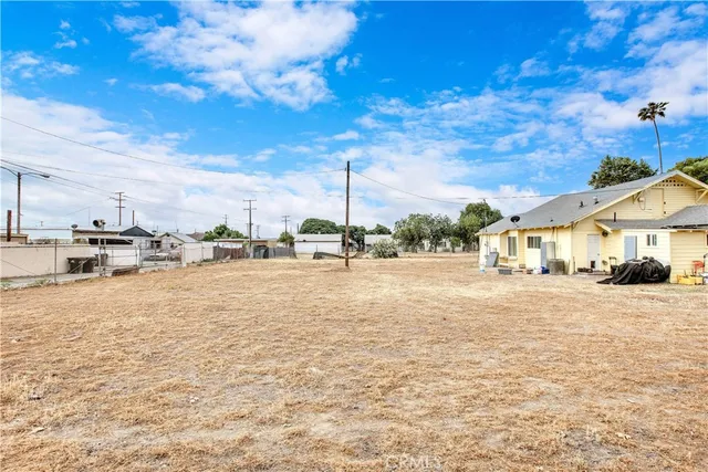 a view of car parked in front of a house