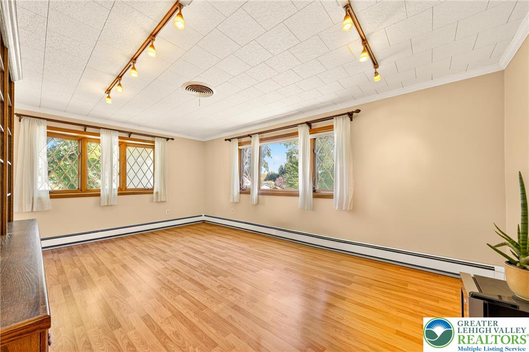 1814 Ruth Street Allentown, PA 18104 - Photo 12 of 47 a view of an empty room with a window and wooden floor