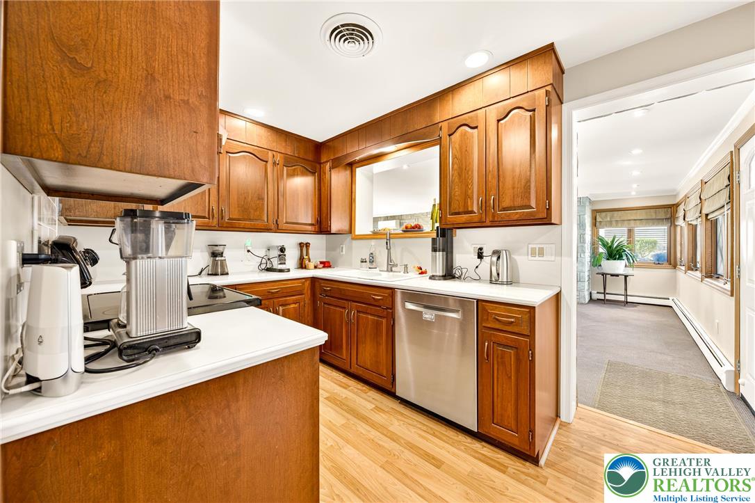 1814 Ruth Street Allentown, PA 18104 - Photo 20 of 47 a large kitchen with a sink and cabinets