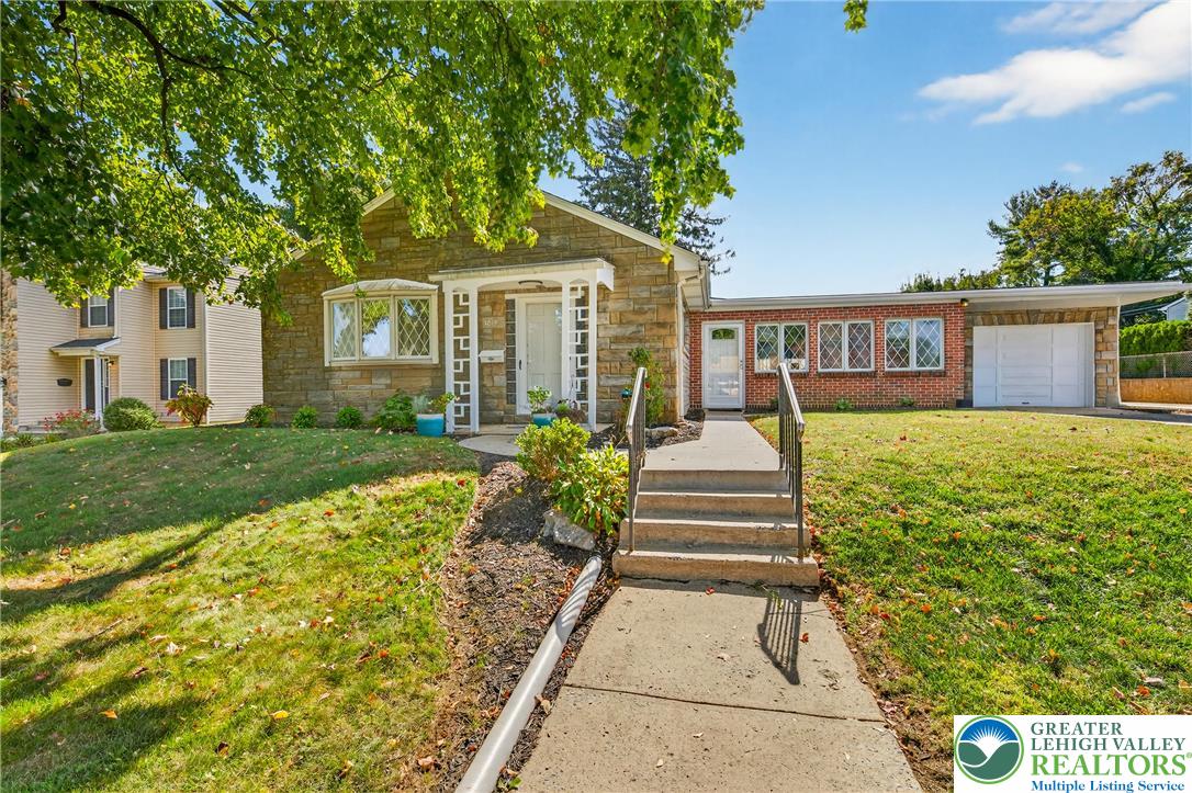 1814 Ruth Street Allentown, PA 18104 - Photo 2 of 47 a front view of a house with a yard and trees