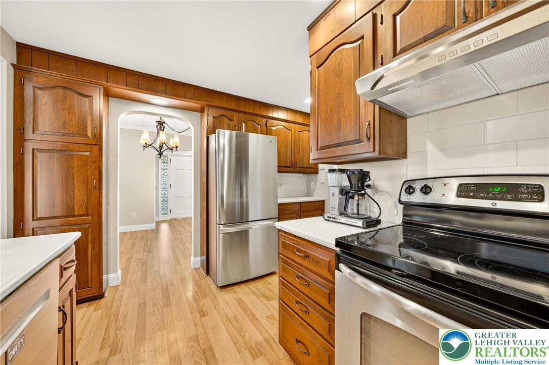 1814 Ruth Street Allentown, PA 18104 - Photo 22 of 47 a kitchen with a refrigerator stove and cabinets