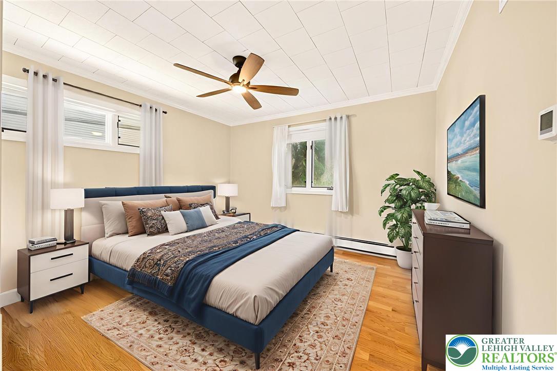 1814 Ruth Street Allentown, PA 18104 - Photo 23 of 47 a bed room with a bed mirror and a window