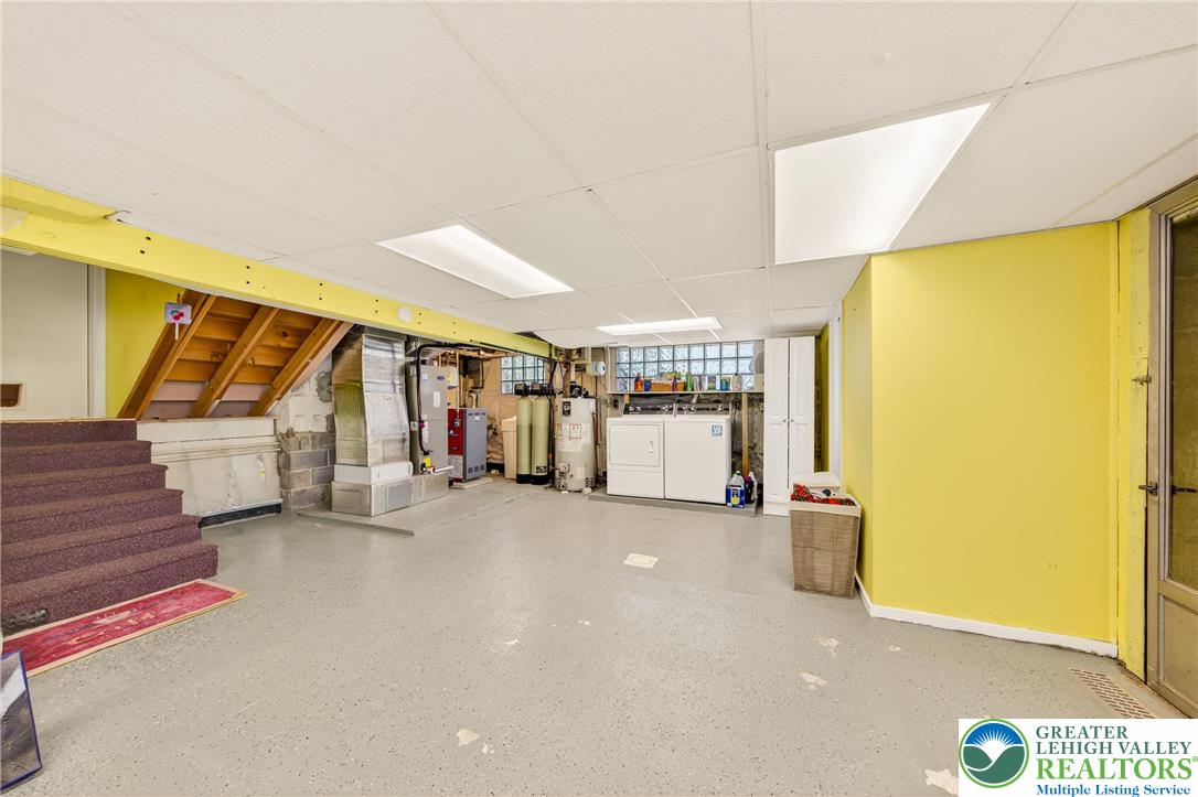 1814 Ruth Street Allentown, PA 18104 - Photo 33 of 47 a view of hallway with stairs and a couch