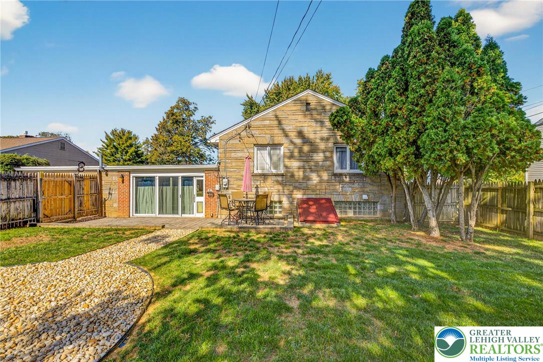 1814 Ruth Street Allentown, PA 18104 - Photo 42 of 47 a view of a house with a yard and a garden