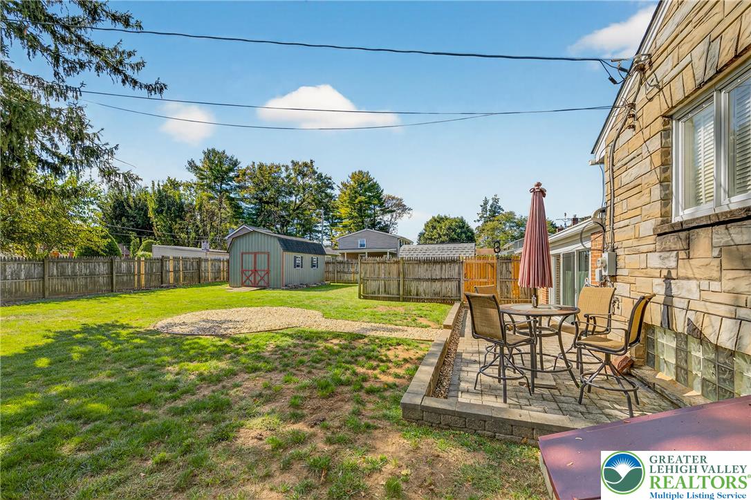 1814 Ruth Street Allentown, PA 18104 - Photo 43 of 47 a view of a swimming pool with an outdoor seating and a yard