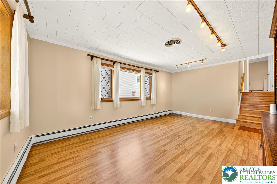 1814 Ruth Street Allentown, PA 18104 - Photo 10 of 47 a view of an empty room with a window and wooden floor