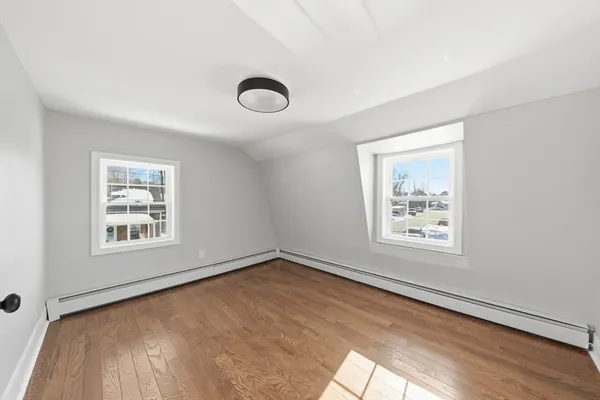 a view of a room that has a window in it