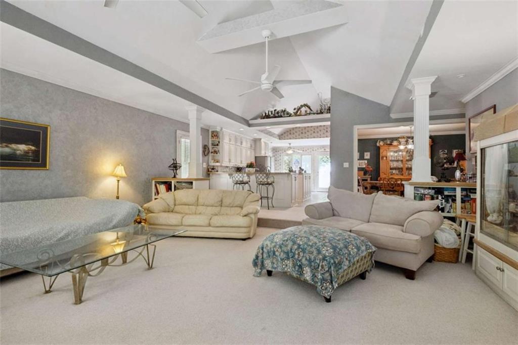 4751 Bill Cheek Road Auburn, GA 30011 - Photo 21 of 82 a living room with furniture and a large window