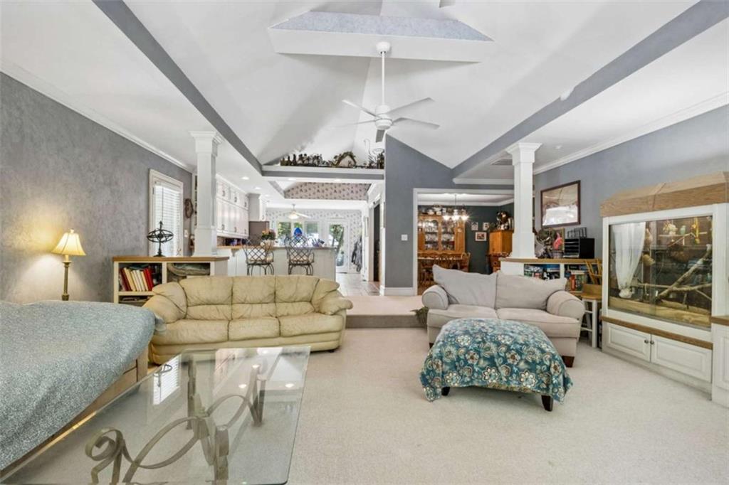 4751 Bill Cheek Road Auburn, GA 30011 - Photo 22 of 82 a living room with furniture and a large window
