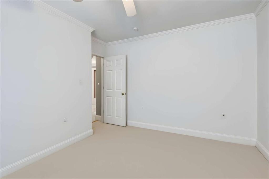 4751 Bill Cheek Road Auburn, GA 30011 - Photo 47 of 82 an empty room with an entryway