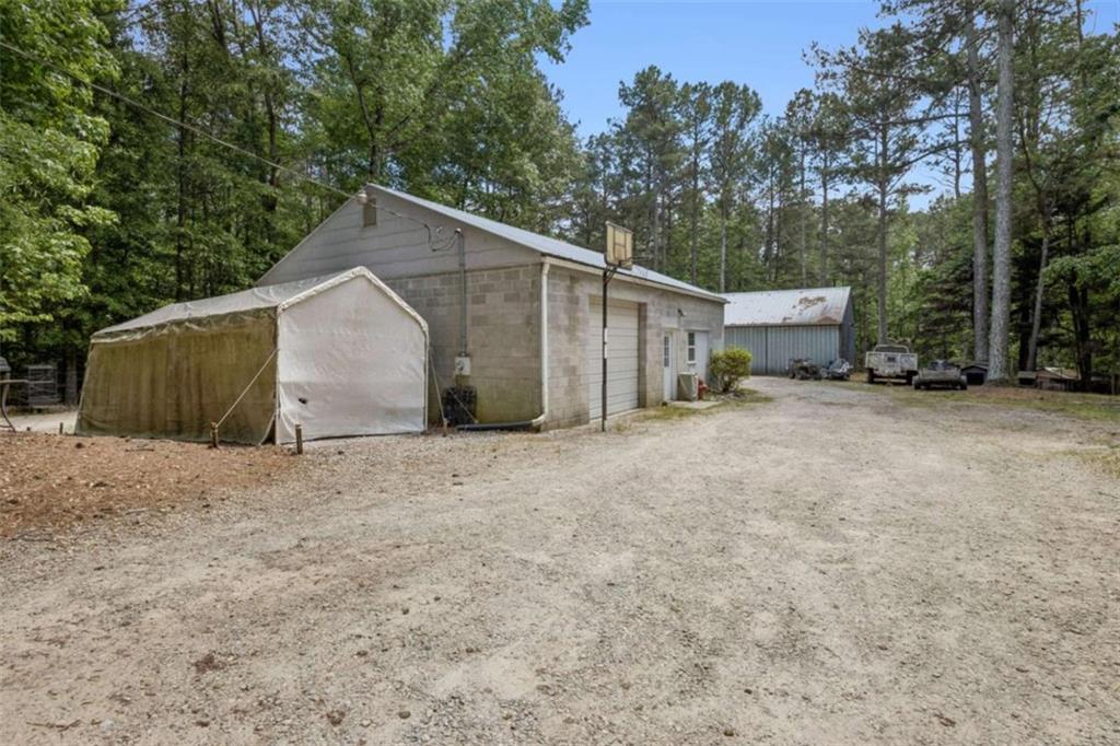 4751 Bill Cheek Road Auburn, GA 30011 - Photo 55 of 82 a view of backyard of house