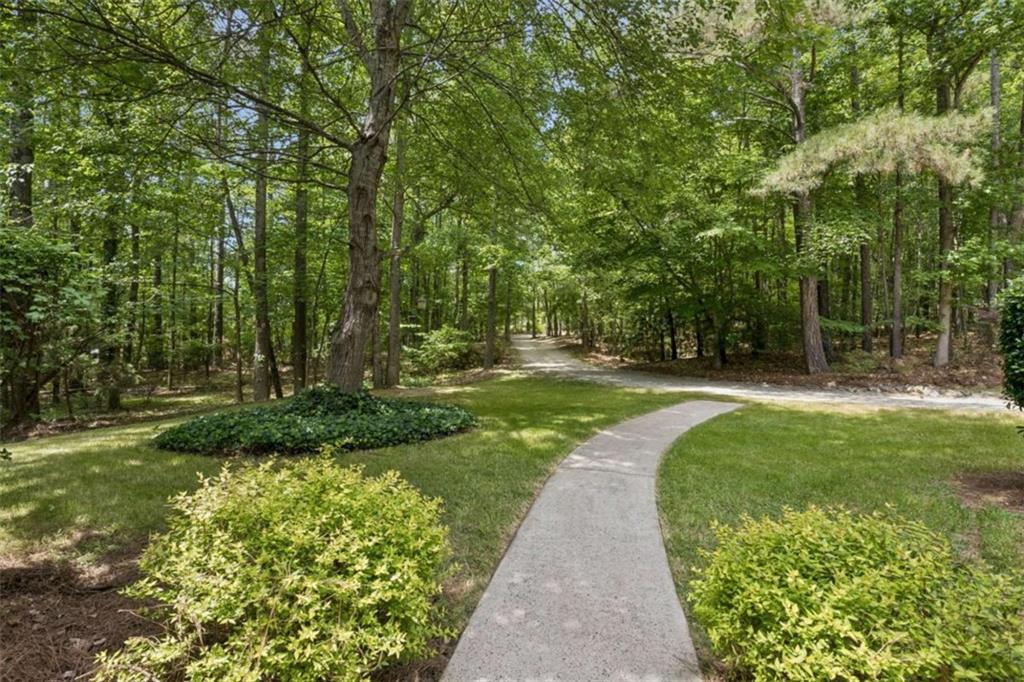 4751 Bill Cheek Road Auburn, GA 30011 - Photo 7 of 82 a view of a park with large trees
