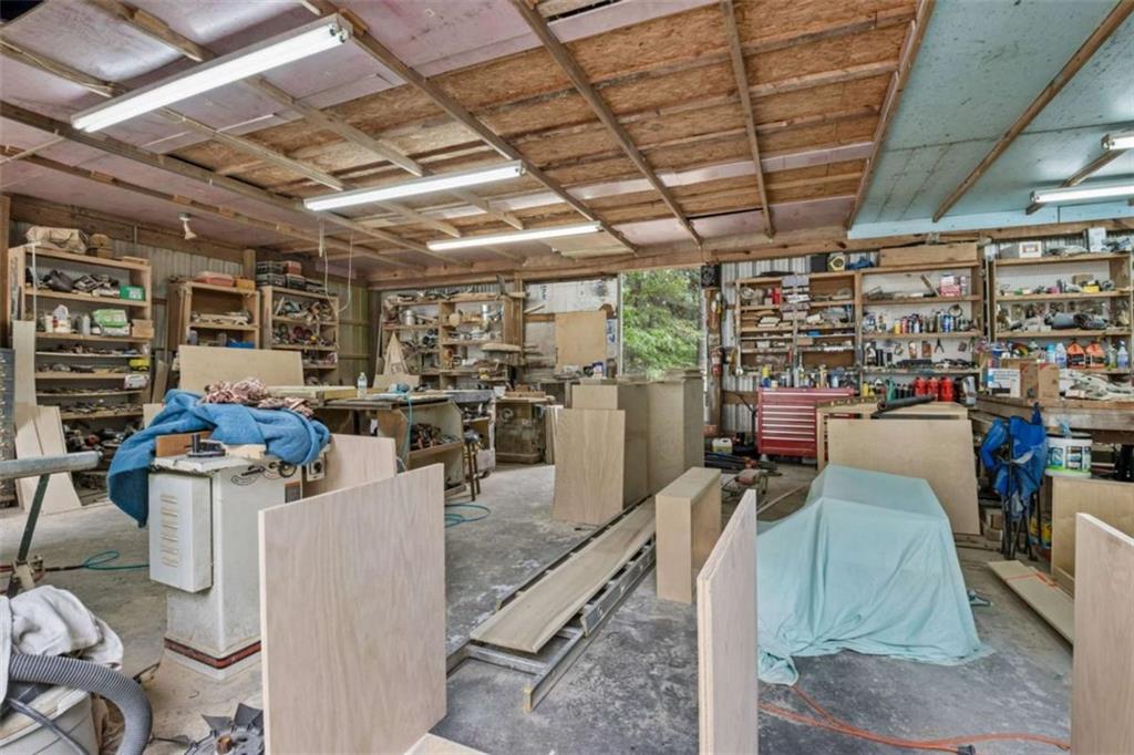 4751 Bill Cheek Road Auburn, GA 30011 - Photo 72 of 82 a view of a room with gym equipment