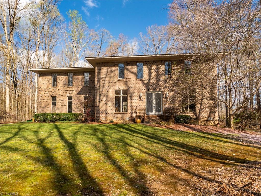 725 Hudson Road Summerfield, NC 27358 - Photo 1 of 36 Beautiful custom built home on 22+ acres of land!