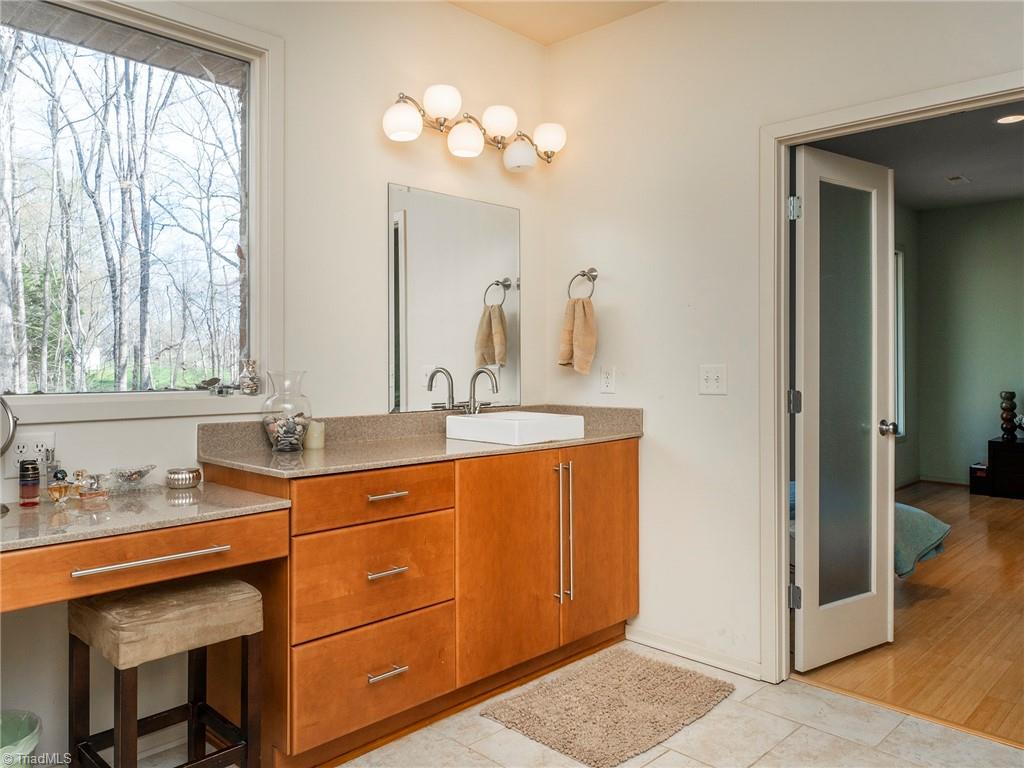 725 Hudson Road Summerfield, NC 27358 - Photo 18 of 36 Large owner suite bath with double vanity.