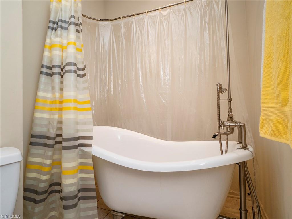 725 Hudson Road Summerfield, NC 27358 - Photo 25 of 36 Shower/tub combo in hall bath.