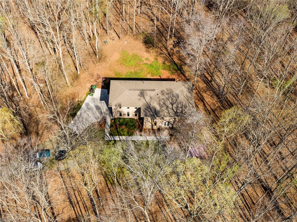 725 Hudson Road Summerfield, NC 27358 - Photo 36 of 36 Overhead view of the home with wooded privacy.