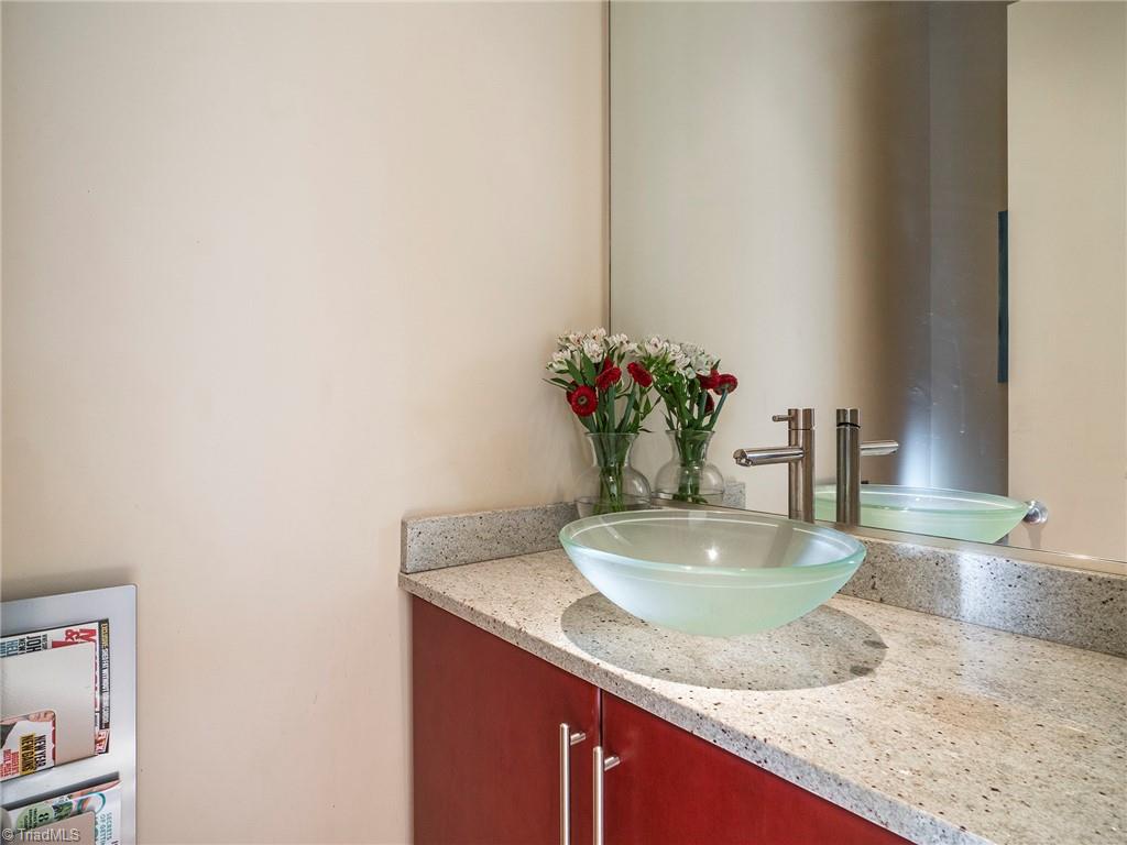 725 Hudson Road Summerfield, NC 27358 - Photo 9 of 36 Half bath on main with glass bowl vanity.