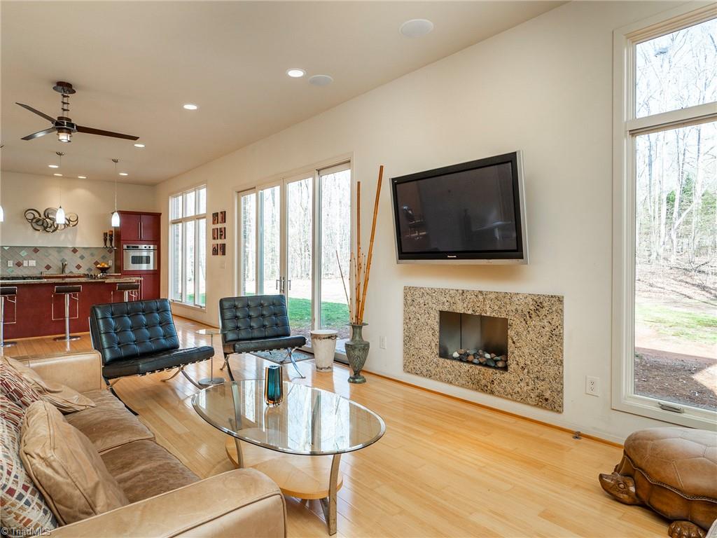725 Hudson Road Summerfield, NC 27358 - Photo 10 of 36 Beautiful open living space with recessed lightning and gas fireplace