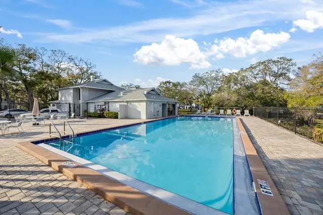 a view of wooden deck with a lake