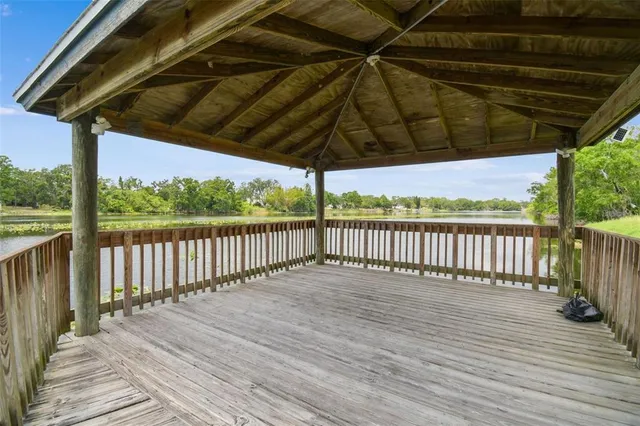 a view of a lake with a building in the background