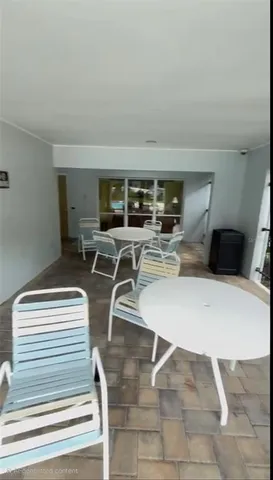 a view of swimming pool from a window