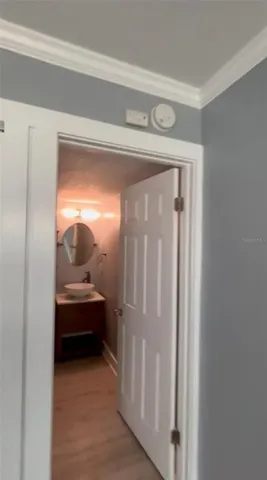 a bathroom with a sink and mirror