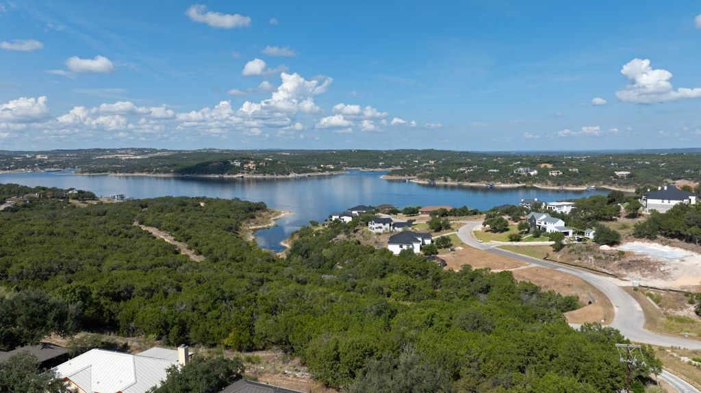 406 Summit Ridge Drive North Lago Vista, TX 78645 - Photo 13 of 25 a view of a lake in middle of the town
